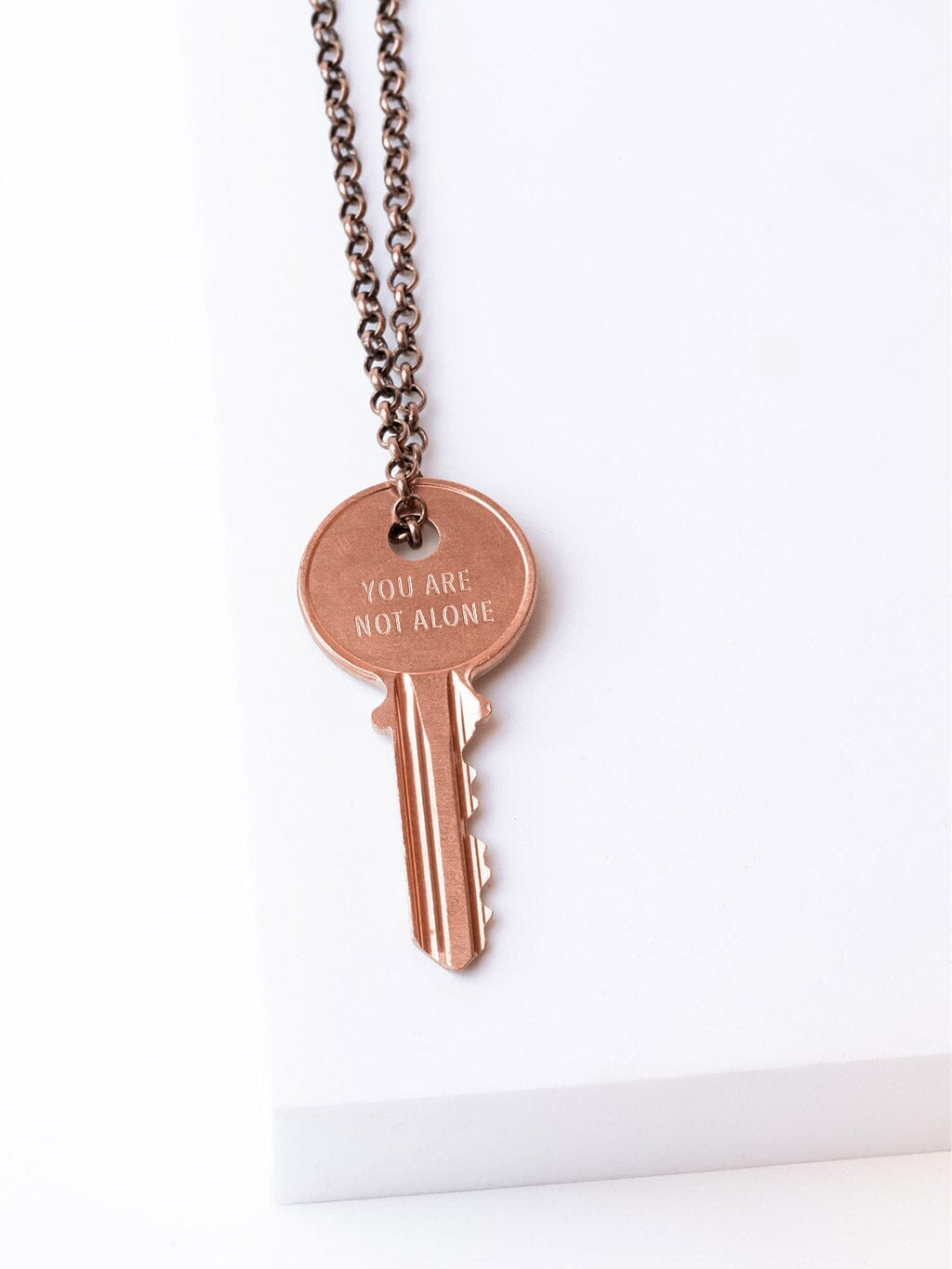 YOU ARE NOT ALONE Classic Key Necklace